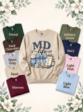 MD LIFE sweatshirt in Sand with labeled color options